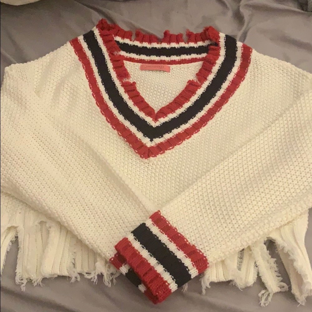 Distressed cropped sweater